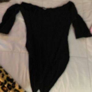 Solid black off the shoulder body suit